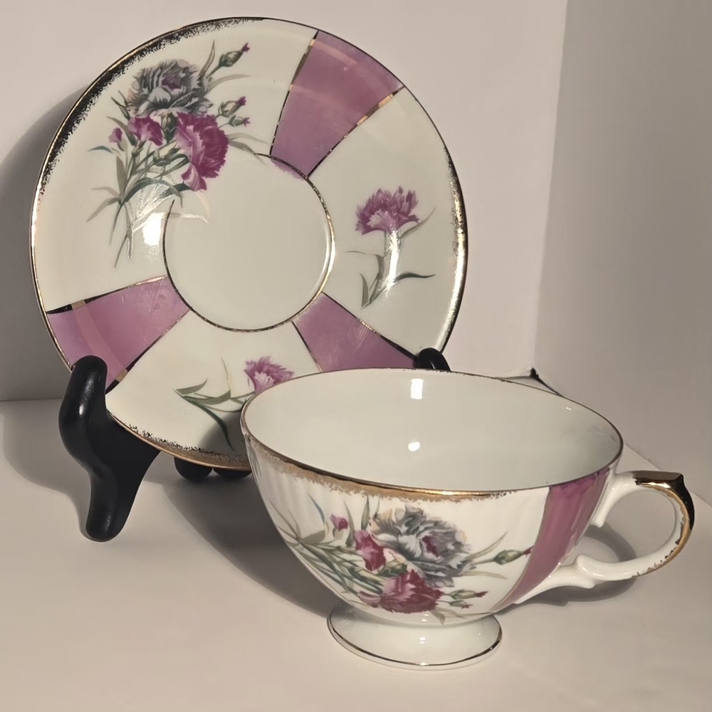 Floral Tea Cup and Saucer Set. "Flower of the month" series (January.)